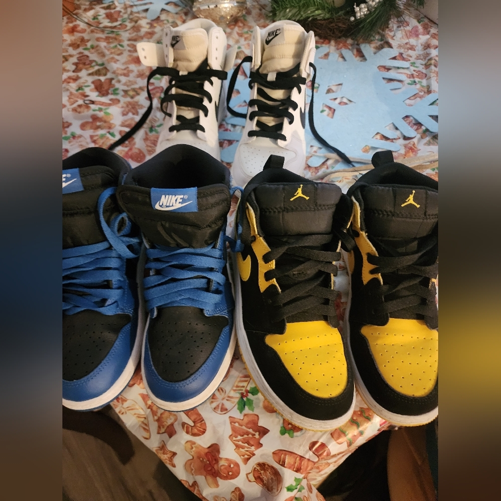 2 nikes and pair of jordans air force 1s